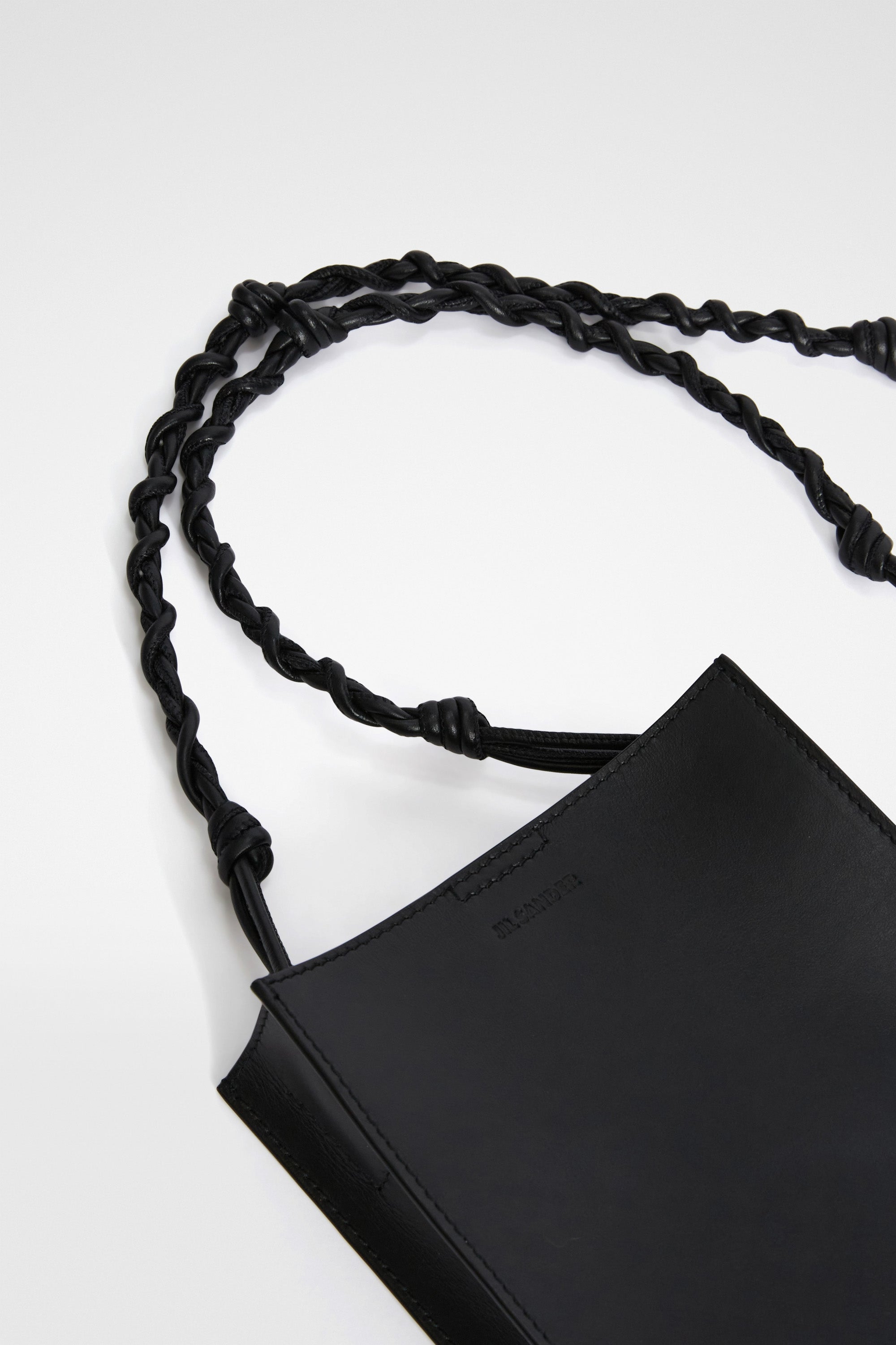 Leather Tangle small crossbody bag for Men | Jil Sander UAE